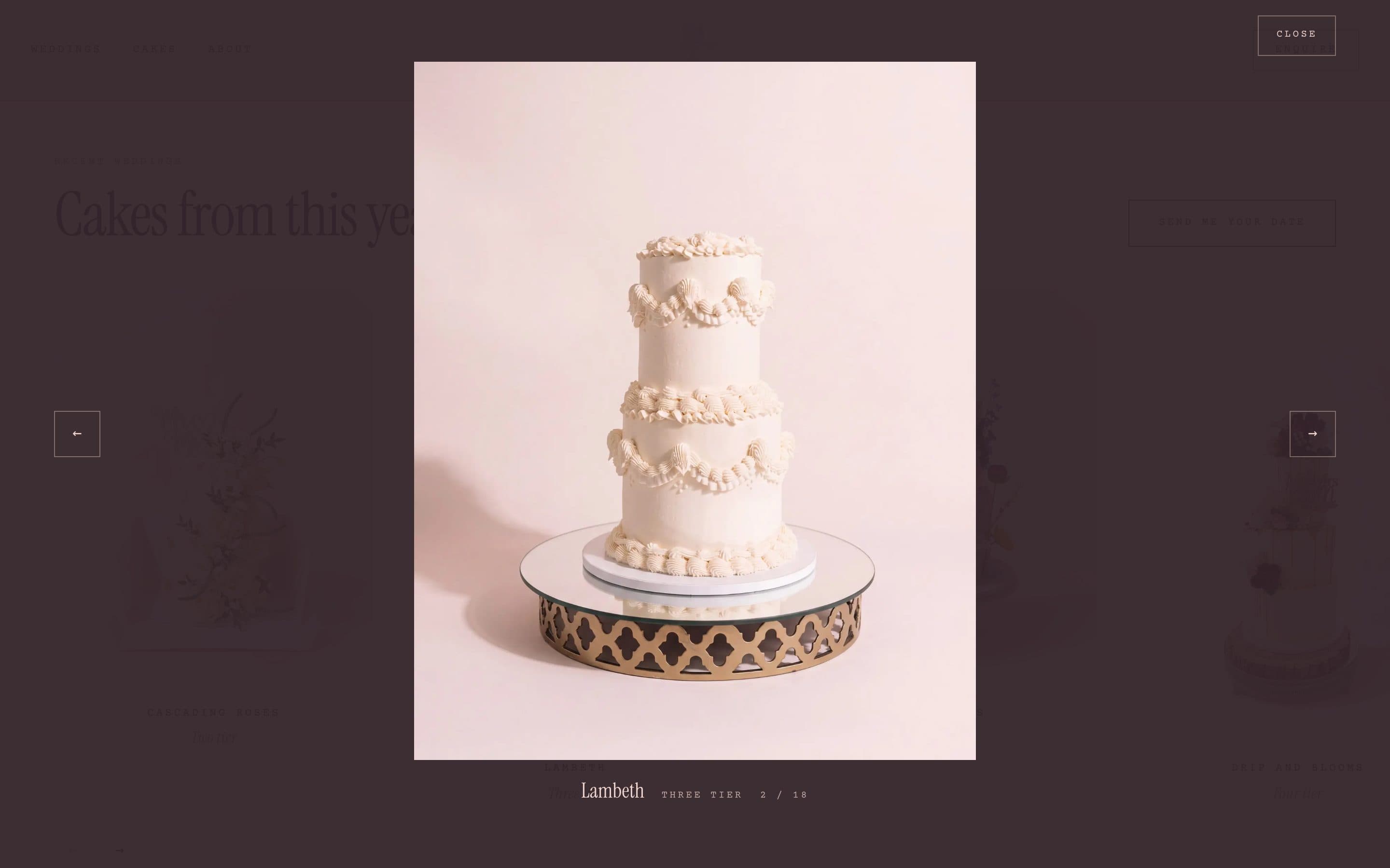 A three tier Lambeth wedding cake opened full screen on the site